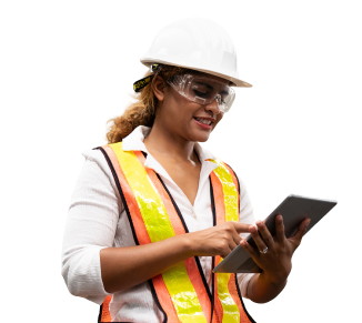 A person wearing a hard hat and high visibility clothing using a tablet