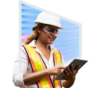 A person wearing a hard hat, safety glasses, and high visibility clothing using a tablet